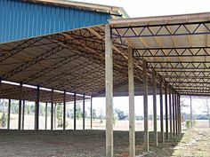 an outdoor covered area with several metal structures