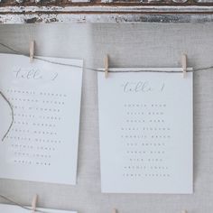 wedding seating chart hanging on clothes pins