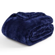 a blue blanket folded on top of each other