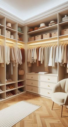 an organized walk in closet with lots of clothes and shoes on the shelves, along with a chair