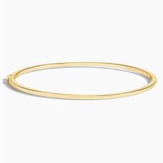 Whisper 6.5 In. Bangle Bracelet - 14K Yellow Gold. This 6.5-inch bangle embellishes the wrist with lustrous light for an elegant and stackable look. Formal 14k Gold Diamond Bangle Bracelet, Gold Hoop Bangle With Polished Finish, Classic Bangle With Gold Clasp, Classic Bangle Jewelry With Gold Clasp, Gold Hoop Bracelet With Polished Finish, Yellow Gold Bangle Bracelet With Gold Clasp, 14k Gold Bangle With Shiny Finish, Classic Everyday Luxury Bangle, Modern Gold Clasp Bangle Jewelry