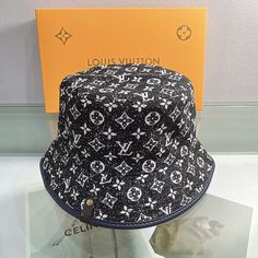 SHOP MORE LUXURY PRODUCTS HERE Description Louis Vuitton Buddy Bucket Hat In Black The LV Buddy Bucket hat is a casual hat with several styling options. The flexible design features a Monogram canvas tie that can be adjusted using the slide fastener with LV Initials push button, or removed altogether. Hooks allow the hat to be clipped onto a handbag strap for easy carrying. BlackClean by a professional only Includes box, dust bag.This product is of the premium quality. Gucci Gg Belt, Dior Shirt, Louis Vuitton Shirt, Chanel Shirt, Black Louis Vuitton, Reversible Belt, Casual Hat, Luxury Products, Handbag Straps