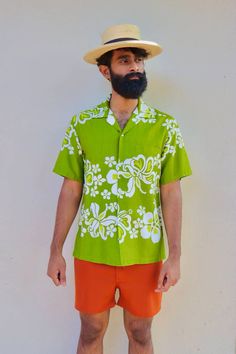 Party into the retro vibe of this true vintage 1960s to 1970s button down. A must have for anyone who values the past, yet lives for the fashion of the present. This amazing shirt has lasted the test of time & is waiting to make its debut into the world of luaus yet again Note: these pictures were taken in bright sunlight, the color is more closer to the pictures that appear in shade.  Condition: Very Good Brand: HAWAIIAN tags Color: Green & White  Men's Size: M Women's: S/M/L/XL depending on desire Aura: 1980s to 1990s Mood: Beach Tags: VINTAGE * ABSTRACT * 80S TO 90S * BUTTON UP * COLLARED SHIRT * SUMMER BEACH VIBE * HAWAIIAN * T-SHIRT * DRESS UP SHIRT * RETRO MENS * Cheap Vintage Multicolor Hawaiian Shirt, Green Retro Print Shirt For Spring, Retro Beach Shirt For Spring, Retro Printed Hawaiian Shirt For Spring, Spring Retro Printed Hawaiian Shirt, Retro Hawaiian Shirt For The Beach, Vintage Printed Hawaiian Shirt For Spring, Retro Hawaiian Shirt With Button Closure For Summer, Retro Hawaiian Shirt For Spring Beach