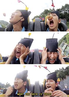 two people in graduation caps are laughing and talking on their cell phones