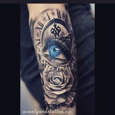 a person with a tattoo on their arm and an eye in the middle of it