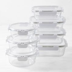 six clear storage containers stacked on top of each other