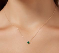 14K SOLID YELLOW GOLD BEZEL SETTING 0.30 CARAT SOLITAIRE EMERALD NECKLACE Here is a dainty, delicate and simple, yet classy minimalist 4 Prong lab created Emerald Solitaire Necklace. This is 14k Solid Gold. (We do not sell filled or plated jewelry) Perfect for everyday use. Metal : 14K Solid Gold Necklace Length : 16 inches / 41.5cm Pendant Width : 4mm Gemstone : 4mm Emerald Total Carat: 0.30ct ---MADE IN USA--- ---Absolutely stunning. Comes in a gift box. ---Shipping Policy---- Item will be shi Emerald Pendant Simple, Yellow Gold Heart Necklace, Classy Minimalist, Preppy Jewelry, Bezel Necklace, Solitaire Necklace, Accesories Jewelry, Lab Created Emerald, Solid Gold Necklace