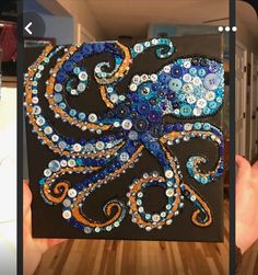 an octopus made out of buttons is shown in two different pictures, one with blue and orange colors