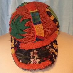 Colorful Patchwork Hat Made In Columbia, Nwt, The Extra Fabric Keeps Your Head Warm. Orange Cotton Beach Hat, Fun Orange Adjustable Hat, Orange Cap For Vacation, Orange Cap, One Size Fits Most, Orange One Size Fits Most Cap, Handmade Orange Cap, Vintage Multicolor One Size Hats, Fun Orange Hat With Curved Brim, Orange Bohemian Bucket Hat