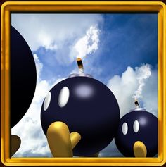 an image of some black balls in the air with clouds behind them and blue sky