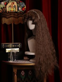 This wig features a long, curly design with ample volume, making it both light and fluffy. The curly bangs come pre-styled to add extra fluffiness, creating a high crown that beautifully frames the face, giving the illusion of a smaller visage. Additionally, the set includes a pair of wavy synthetic hair claw clips, which perfectly complement the main wig and add a finishing touch to your look.  The wig measures 70cm in length, while the ponytail claw clips are 60cm long.  The price includes one Victorian Hairstyles With Bangs, Messy Updo Wig, Victorian Wig, Era Hairstyles, Fantasy Hair Wig, Big Poofy Hair 70s, Victorian Era Hairstyles, Curly Design, Fluffy Wig