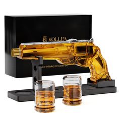 PRICES MAY VARY. Enhance The Flavor: The material, which is made of lead-free glass, is designed to preserve, and improve the flavor and mouthfeel of your alcoholic drinks, such as whisky, rum, bourbon, vodka, and tequila. To impart a substantial quality and provide a smoother sipping experience, this gun whiskey decanter is the ideal status-defining, worthwhile investment for whisky aficionados. Extraordinary Gift Choice: Are you still struggling to search for an impressive gift for your specia Liquor Decanter Set, Glasses Unique, Whisky Decanter, Liquor Dispenser, Whiskey Decanter Set, Baskets For Men, Liquor Decanter, Drinking Party, Whiskey Decanter