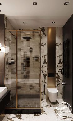 a bathroom with marble walls and flooring in black and white colors, including a shower stall