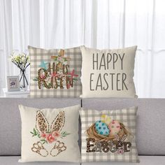 three pillows on a couch with the words happy easter