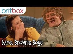 two women sitting next to each other on a couch with the caption mrs brown's boys