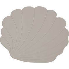 a white shell shaped placemat on a white background