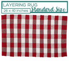 a red and white checkered table cloth with the text layering rug standard size