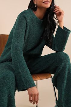 Cozy up on the couch and get ready for a relaxing weekend with the Lulus Signature Sunday Dark Green Raglan Sleeve Pullover Sweater! Lightweight fuzzy sweater knit shapes this cozy sweater that has long raglan sleeves and a crew neckline. A notched, slightly high-low hem completes the look. Pair with the matching pants for a complete look! Fit: This garment fits true to size. Length: Size medium measures 21.75" from shoulder to hem. Bust: Great for any cup size. Waist: Not Fitted - comfortable room throughout midsection. Undergarments: May be worn with any standard bra. Fabric: Fabric is very stretchy. Unlined. 53% Polyester, 25% Acrylic, 20% Recycled Polyester, 2% Spandex. Hand Wash Cold. Do Not Bleach. Line Dry. Iron Low Heat. Imported. Lulus | Signature Sunday Dark Green Raglan Sleeve P Forest Green Sweater Outfit, Green Sweater Outfit, Forest Green Sweater, Relaxing Weekend, Raglan Pullover, Fuzzy Sweater, Comfortable Room, Matching Pants, Cozy Sweater