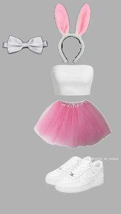 a pink tutu skirt and white top with bunny ears