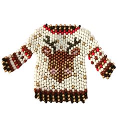 the beaded sweater is decorated with an animal's head and red, white, and brown colors