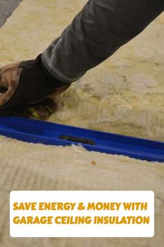 a person is cleaning the floor with a blue mat