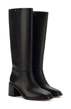 This tall leather boot influenced by classic menswear is sure to give '90s vibes to any outfit you wear. 2" heel 15 3/4" shaft; 16" calf circumference Leather upper, lining and sole Made in Brazil Latinx Owned/Founded Anthropologie Store, Tall Black Boots, Nyc Winter, Winter Trip, Black High Heel Boots, N Shoes, Heel Boot, Black Boots Tall, Paloma Wool