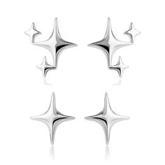 four pairs of silver ear studs with stars on the top, and one pair is shown