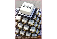 a computer keyboard with the word k & m on it's keypads