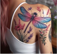 a woman with tattoos on her back has a dragonfly tattoo on her upper arm