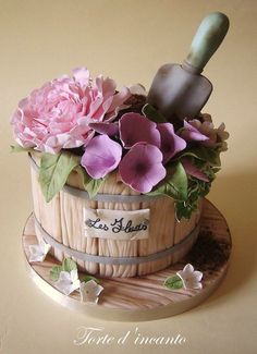 there is a cake that has flowers in it