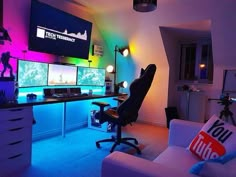 a living room filled with lots of computer monitors