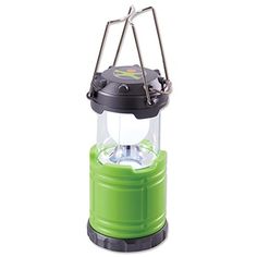 the green lantern is lit up and ready to be used as an emergency light for camping