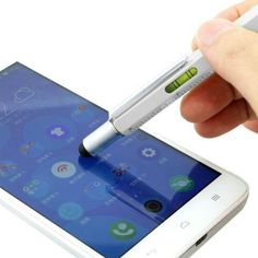 a person is holding a pen and touching the screen of a cell phone with it