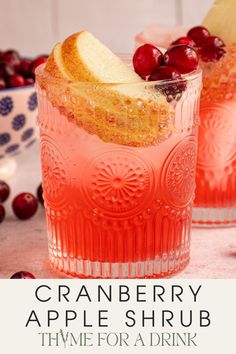 cranberry apple shrub thyme for a drink with an orange slice in it