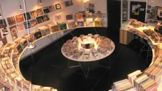 an overhead view of a book store with books on the shelves and lights hanging from the ceiling