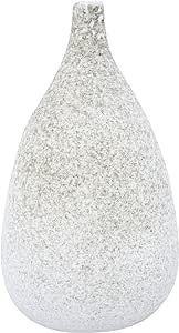 a white vase with silver speckles on the top and bottom, sitting in front of a white background