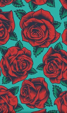 a blue and red rose wallpaper with green leaves on the bottom right hand corner