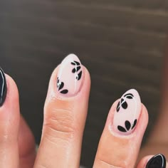 Talitha Chavira on Instagram: "Pt.2 but black.  #nailart #nails #aznails #beauty #nailinspo ##nailsoftheday #fallnails #naildesigns #gelnails #structurednails #goodyearaz #buckeyeaz #avondale #Litchfield park #litchfieldparkaz #phoenixarizona #luminarynailsystems #nailtech #loveyourself #selfcare #manicure #aznetwork #explore #explorepage #flowernails #blacknails #almondnails #springnails" Black And White Floral Nails, Black Flower Nail Designs, Nails With Black Flowers, Black And White Flower Nails, Black Flower Nails, Black Floral Nails, Nail Goals, Art Deco Nails