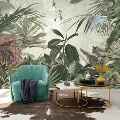 a living room filled with furniture and lots of tropical plants on the wall behind it