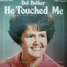 an old photo of a woman smiling on the cover of del belker he touched me