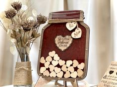 a table topped with a jar filled with hearts