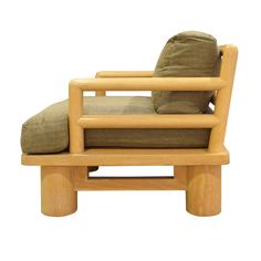 a wooden chair with a pillow on it's back and seat cushion in the shape of a reclining chair