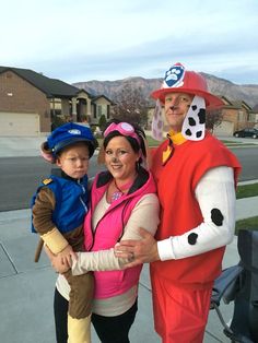 a family dressed up in costumes for halloween