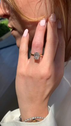 a close up of a person wearing a ring