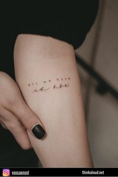 a woman's arm with writing on it that says, all we have is love