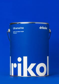 a blue paint can with the words irkol on it's bottom half