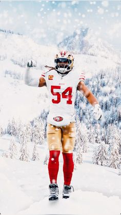 a football player is standing in the snow