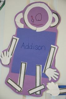 a paper cut out of a monkey holding a sign that says, addson on it