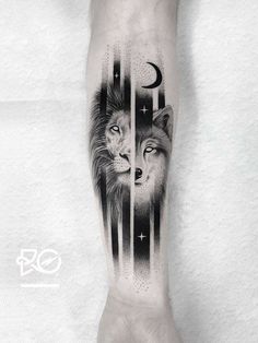 a man with a tattoo on his arm that has two lions and the moon behind it