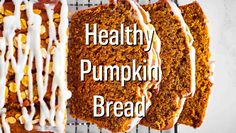 healthy pumpkin bread with white icing on a cooling rack and the words healthy pumpkin bread